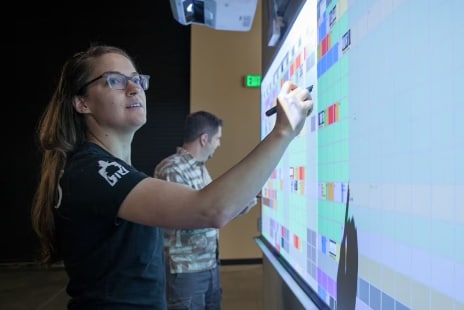 Woman reviewing production schedule