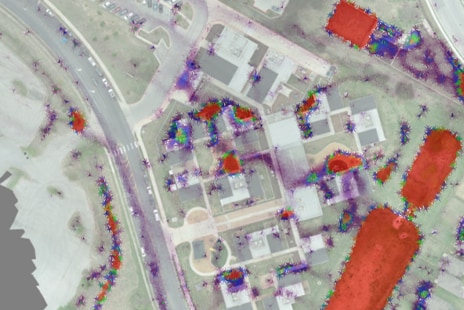 surface drainage model software showing an aerial view of a flooded school